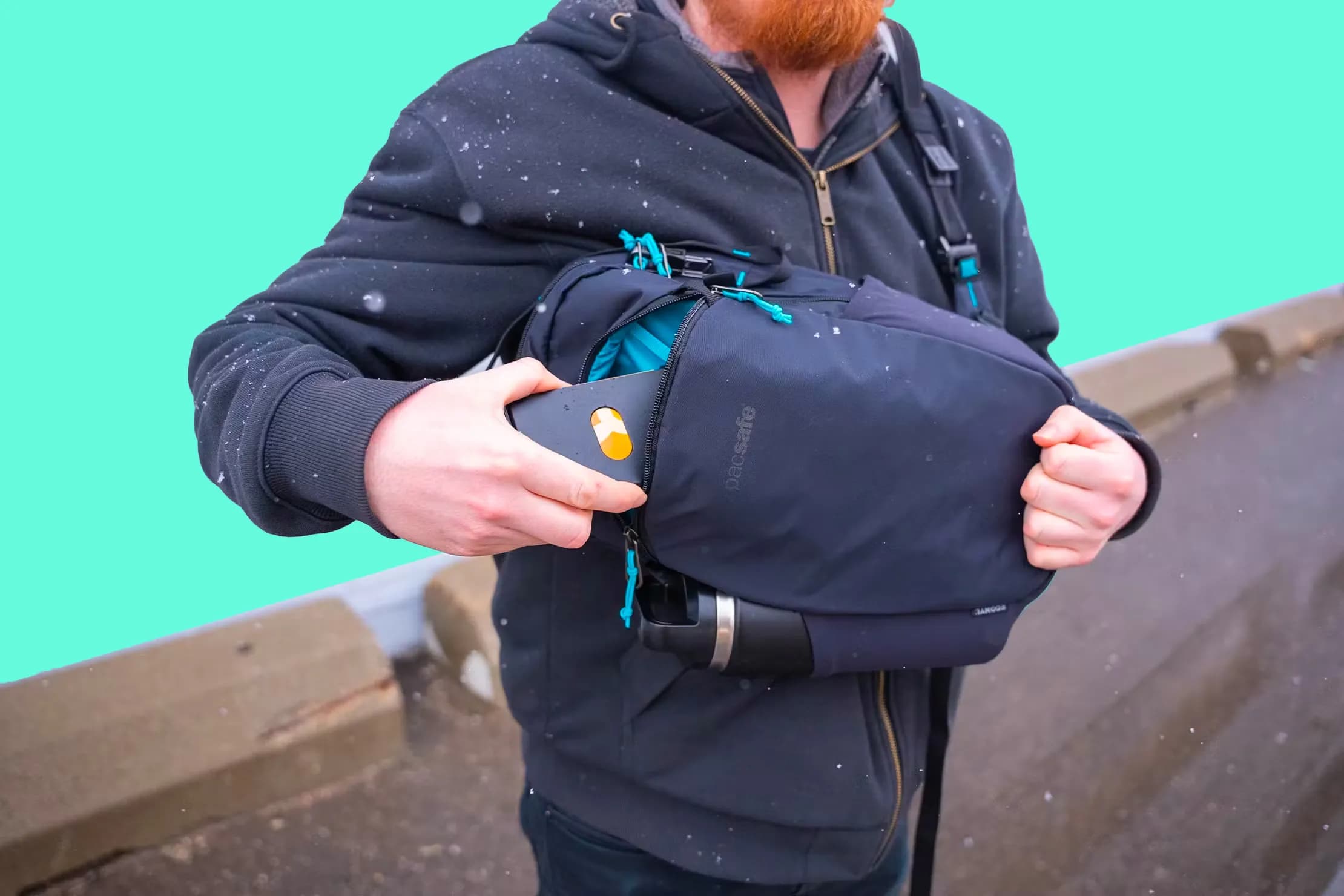 An anti-theft bag featuring multiple security features like lockable zippers, cut-resistant straps, and RFID-blocking pockets, designed for safe travel and urban use