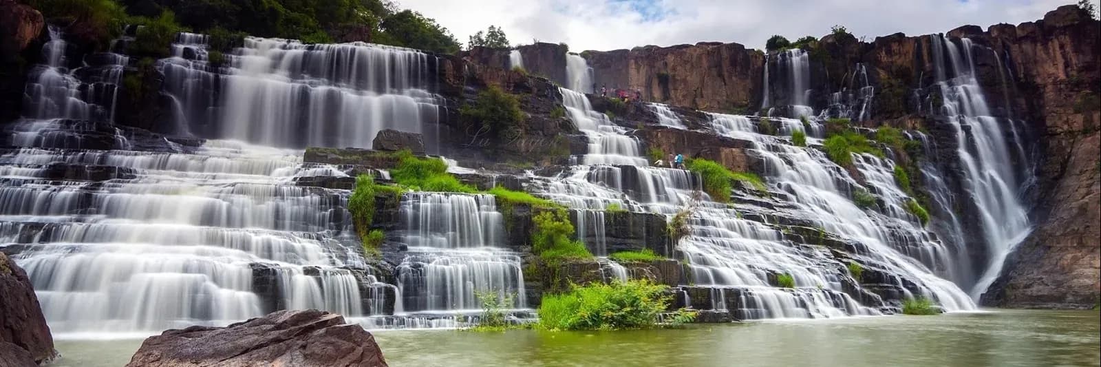 Discover the Spectacular Beauty of Seven-Level Waterfall in Nghe An