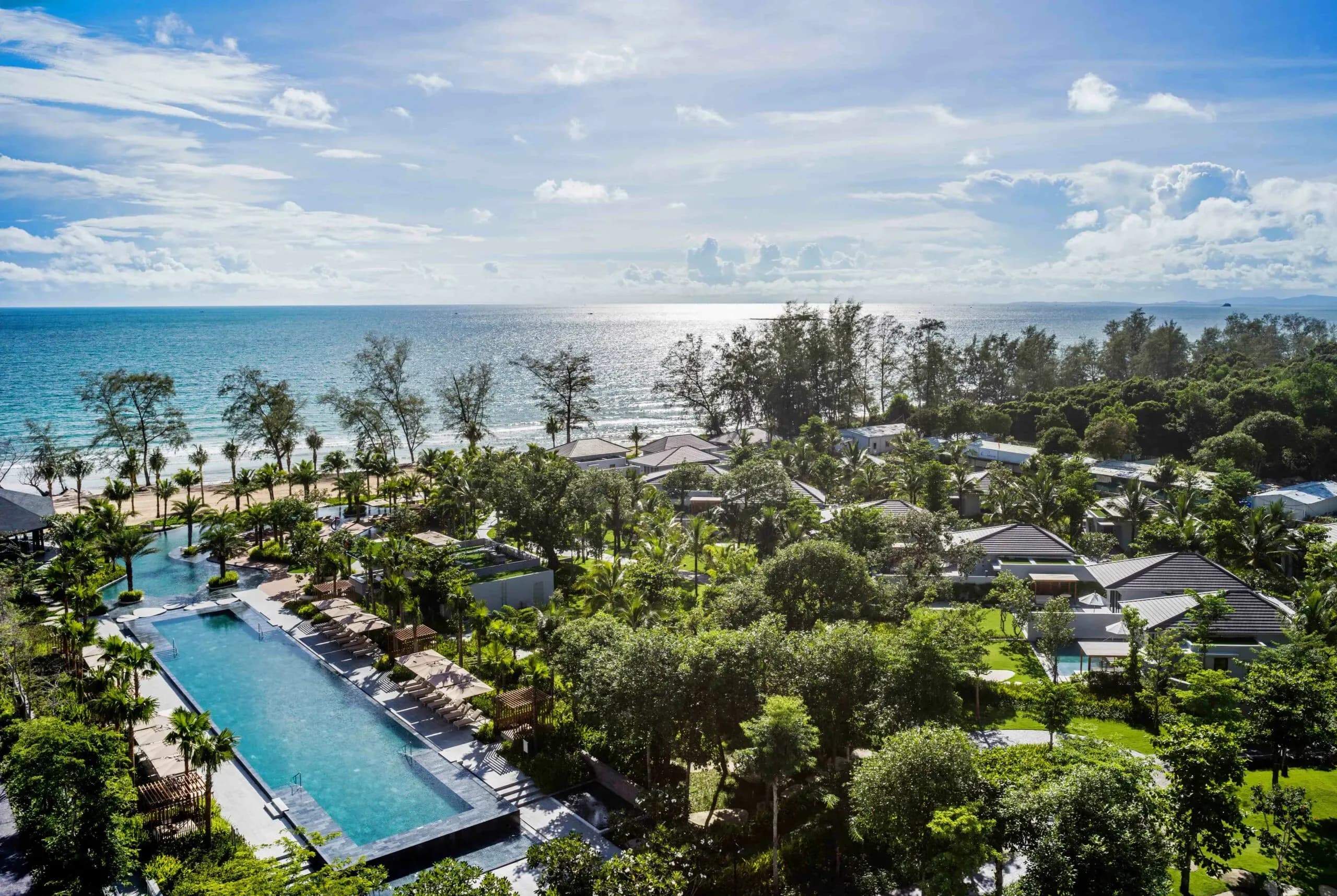The stunning view of the beach and pool at Crowne Plaza Phu Quoc Starbay.