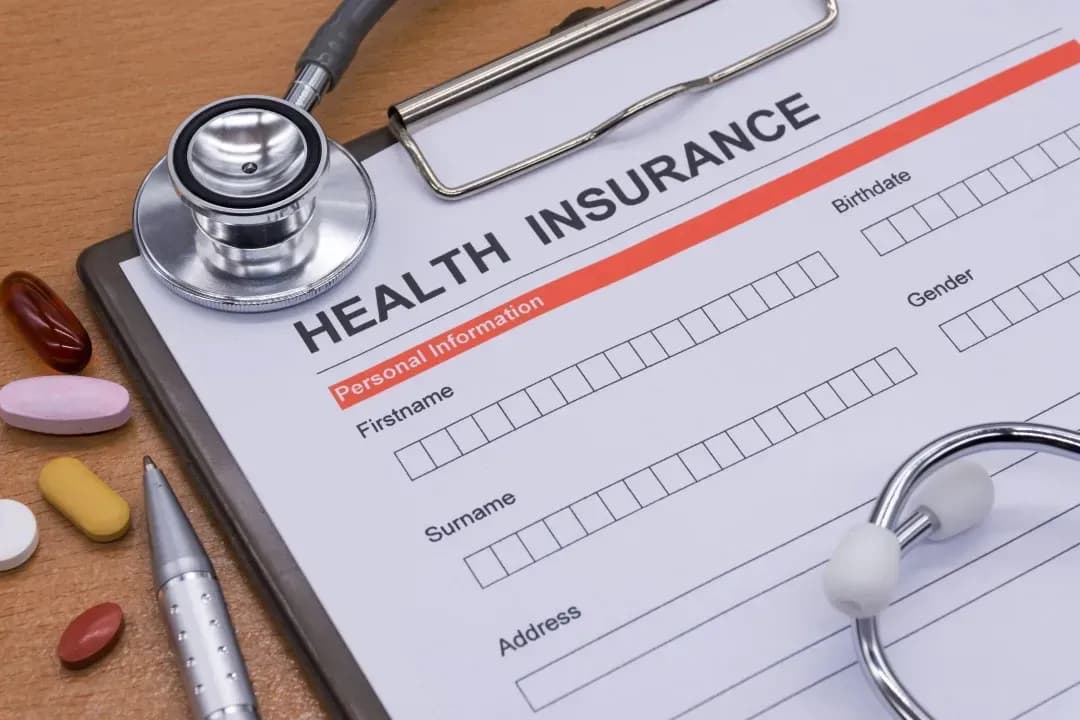 Who must participate in health insurance?