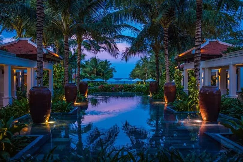 The romantic pool at The Anam Cam Ranh, a perfect spot for evening relaxation.